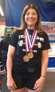 Murph won 1st place for Best Lifter in the Open Division for 60kg weight class and Best Master lifter. Her total was 621lbs. She broke 3 of the GA State Records that she set in October 2012. 